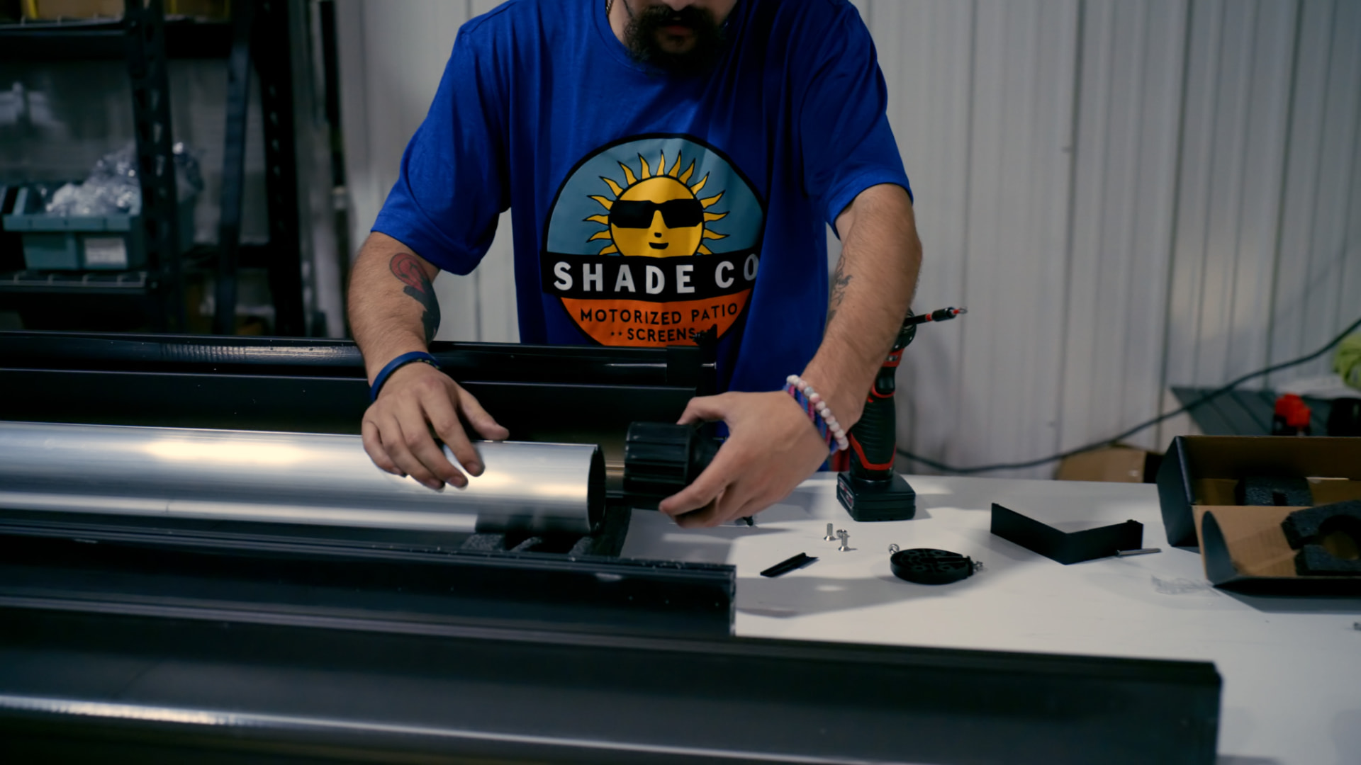 Shade Co technician assembling a shade tube